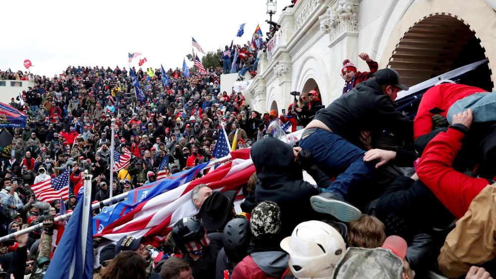 ﻿FILE PHOTO: FILE PHOTO: FILE PHOTO: Pro-Trump protesters storm into the U.S. Capitol during clashes with police, during a rally to contest the certification of the 2020 U.S. presidential election results by the U.S. Congress, in Washington, U.S, January 6, 2021. REUTERS/Shannon Stapleton/File Photo/File Photo/File Photo