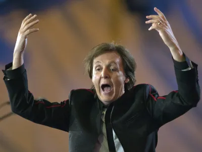 Paul McCartney performs Hey Jude at the end of the opening ceremonies for the 2012 Summer Olympics Saturday, July 28, 2012 in London. (AP Photo/The Canadian Press, Sean Kilpatrick)