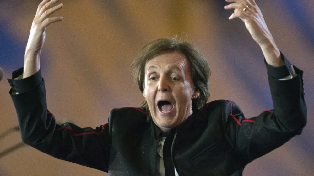 Paul McCartney performs Hey Jude at the end of the opening ceremonies for the 2012 Summer Olympics Saturday, July 28, 2012 in London. (AP Photo/The Canadian Press, Sean Kilpatrick)