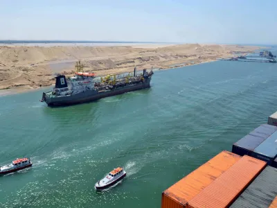 ﻿A cargo ship is seen crossing through the New Suez Canal, Ismailia, Egypt, in this July 25, 2015 file photo. Egypt will open an expansion to the Suez Canal to great fanfare on August 6, 2015, the centrepiece of President Abdel Fattah al-Sisi's plans to revitalise the country's economy. To match EGYPT-SUEZCANAL/ REUTERS/Stringer/Files