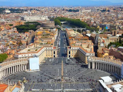 Rome, Italy. Famous Saint Peter's Square in Vatican and aerial view of the city. UNESCO World Heritage Site.