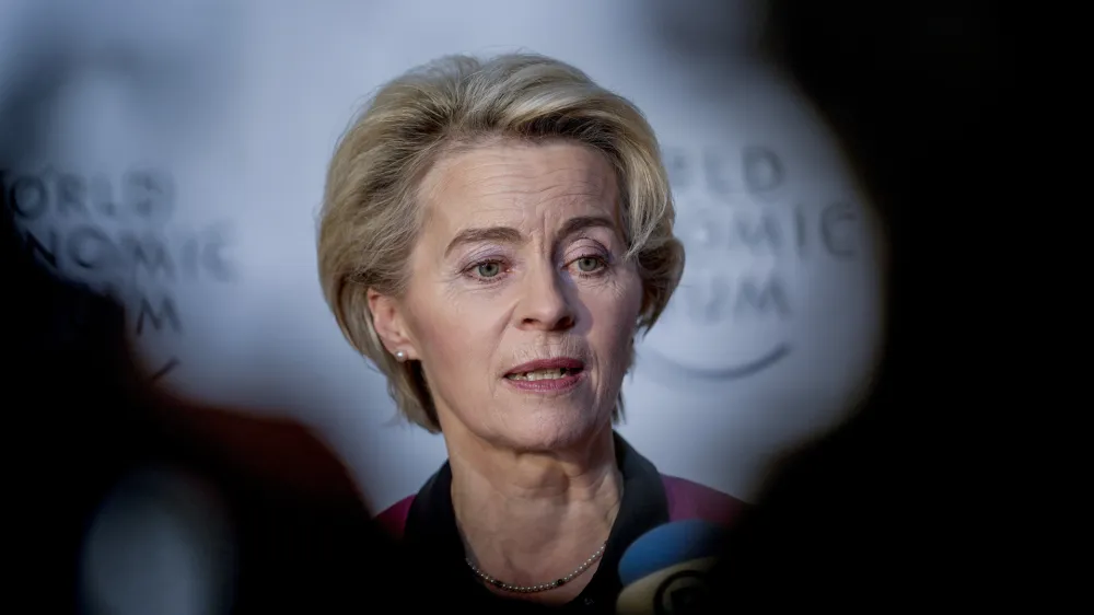 EU Commission President Ursula von der Leyen talks to media people at the World Economic Forum in Davos, Switzerland Tuesday, Jan. 17, 2023. The annual meeting of the World Economic Forum is taking place in Davos from Jan. 16 until Jan. 20, 2023. (AP Photo/Markus Schreiber)