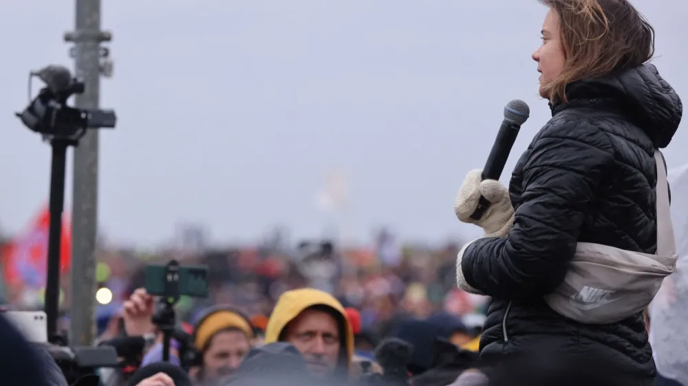 Climate activist Greta Thunberg speaks during a protest against the expansion of Germany's utility RWE's Garzweiler open-cast lignite mine to Luetzerath, Germany, January 14, 2023. REUTERS/Thilo Schmuelgen