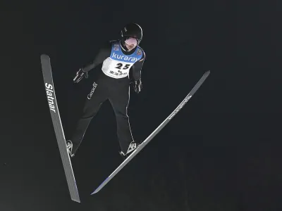 Canadian skier Alexandria Loutitt competes during the first jump of the women's World Cup ski jump event in Zao, Yamagata prefecture, northern Japan, on Jan. 13, 2023. (Yuya Shino/Kyodo News via AP)