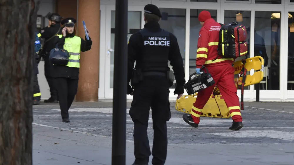 ﻿Police personnel and paramedics outside the Ostrava Teaching Hospital after a shooting incident in Ostava, Czech Republic, Tuesday, Dec. 10, 2019. Police and officials say at least four people have been killed in a shooting in a hospital in the eastern Czech Republic. Two others are seriously injured. (Jaroslav Ozana/CTK via AP)