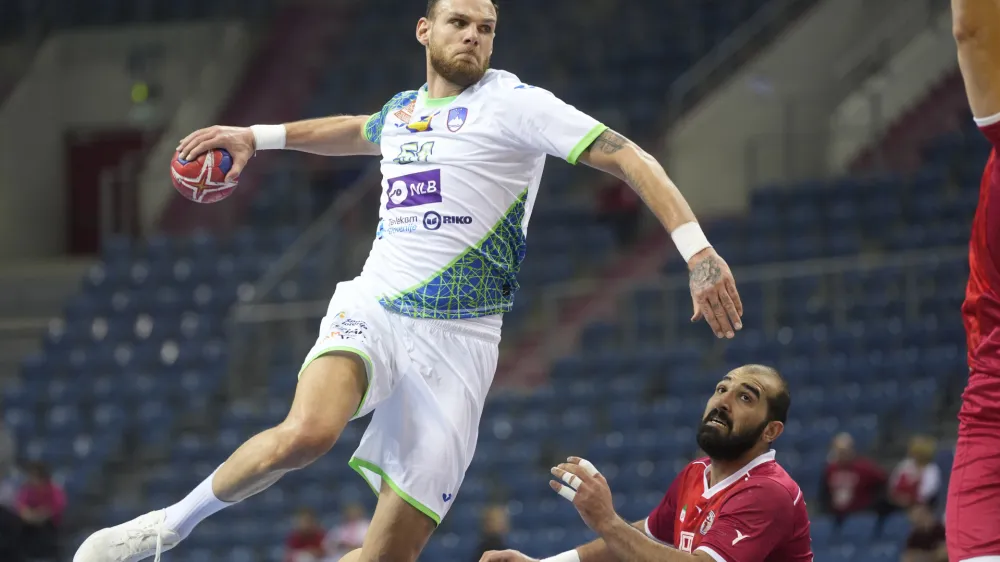 Slovenia's Borut Mackovsek makes a shot during the Main Round Group I, Handball World Championship match between Iran and Slovenia in Krakow, Poland, Wednesday, Jan. 18, 2023 (AP Photo/Piotr Hawalej)