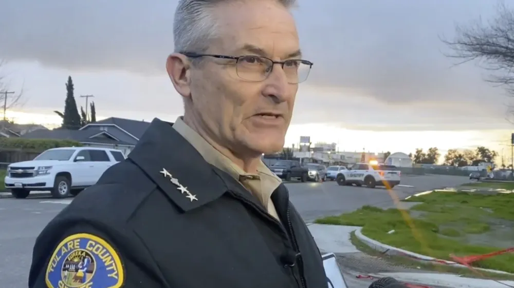 In this frame grab from video provided by the Tulare Count Sheriff's Office, Sheriff Mike Boudreaux speaks to the media near the scene of a fatal shooting in Visalia, Calif., Monday, Jan. 16, 2023. (Tulare County Sheriff's Office via AP)