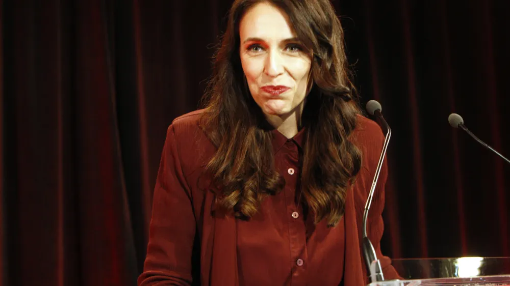 FILE - New Zealand's Labour Party leader Jacinda Ardern talks to hundreds of supporters after election results are announced on Saturday, Sept. 23, 2017, in Auckland, New Zealand. Ardern became an inspiration to women around the world after winning the top job in 2017 at the relatively young age of 37. (AP Photo/Nick Perry, File)