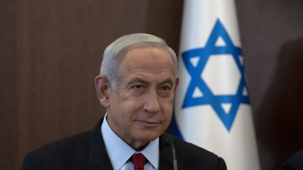 Israel's Prime Minister Benjamin Netanyahu chairs the weekly cabinet meeting in Jerusalem, Sunday, Jan. 22, 2023. (AP Photo/ Maya Alleruzzo, Pool)