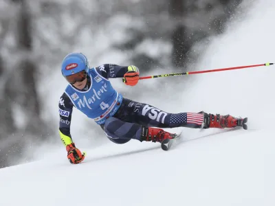 United States' Mikaela Shiffrin speeds down the course during an alpine ski, women's World Cup giant slalom, in Kronplatz, Italy, Tuesday, Jan. 24, 2023. (AP Photo/Alessandro Trovati)