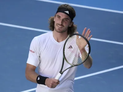 Stefanos Tsitsipas of Greece reacts after defeating Karen Khachanov of Russia in their semifinal at the Australian Open tennis championship in Melbourne, Australia, Friday, Jan. 27, 2023. (AP Photo/Aaron Favila)