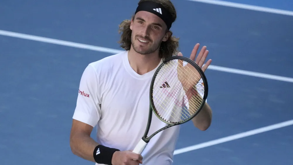 Stefanos Tsitsipas of Greece reacts after defeating Karen Khachanov of Russia in their semifinal at the Australian Open tennis championship in Melbourne, Australia, Friday, Jan. 27, 2023. (AP Photo/Aaron Favila)