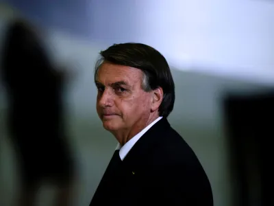 FILE PHOTO: Brazil's President Jair Bolsonaro looks on after a ceremony about the National Policy for Education at the Planalto Palace in Brasilia, Brazil June 20, 2022. REUTERS/Ueslei Marcelino/File Photo