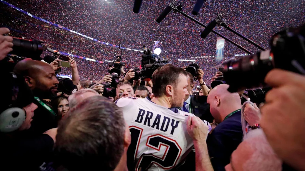 FILE PHOTO: NFL Football - Super Bowl LIII - New England Patriots v Los Angeles Rams - Mercedes-Benz Stadium, Atlanta, Georgia, U.S. - February 3, 2019. New England Patriots' Tom Brady celebrates winning the Super Bowl LIII. REUTERS/Mike Segar/File Photo