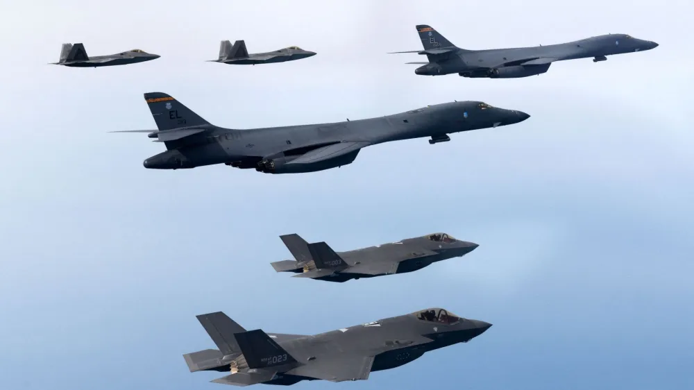 A handout photo dated February 1, 2023 shows South Korean and U.S. Air Forces conducting a combined air training with South Korean F-35A fighters, US B-1B strategic bombers, and F-22 and F-35B fighters participating in the skies over the West Sea, in South Korea. South Korean Defense Ministry/Handout via REUTERS THIS IMAGE HAS BEEN SUPPLIED BY A THIRD PARTY.