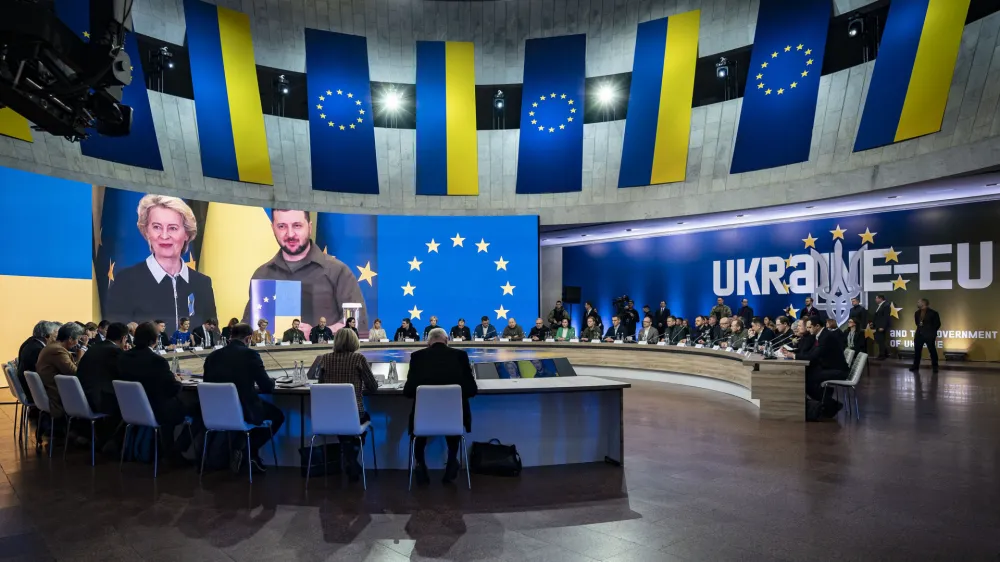 European Commission President Ursula von der Leyen and Ukrainian President Volodymyr Zelenskyy is seen on a screen during the EU-Ukraine summit in Kyiv, Ukraine, Thursday, Feb. 2, 2023. (Ukrainian Presidential Press Office via AP)