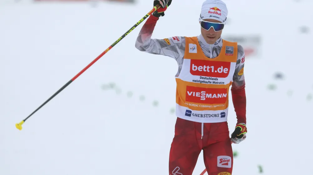 04 February 2023, Bavaria, Oberstdorf: Austrian nordic combined skier Johannes Lamparter crosses the finish line of the men's individual large hill/10 km of the FIS Nordic Combined World Cup in Oberstdorf. Photo: Karl-Josef Hildenbrand/dpa