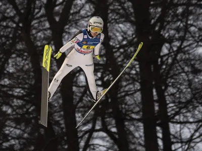 Slovenia's Ema Klinec in action during the World Cup, large hill, team jumping mixed in Willingen, Germany, Friday Feb. 3 2023. (Swen Pfortner/dpa via AP)