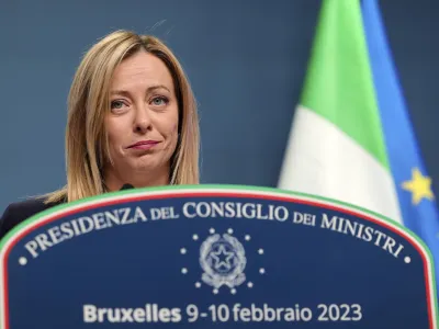 Italy's Prime Minister Giorgia Meloni speaks during a media conference at the European Council building in Brussels, Friday, Feb. 10, 2023. (AP Photo/Olivier Matthys)