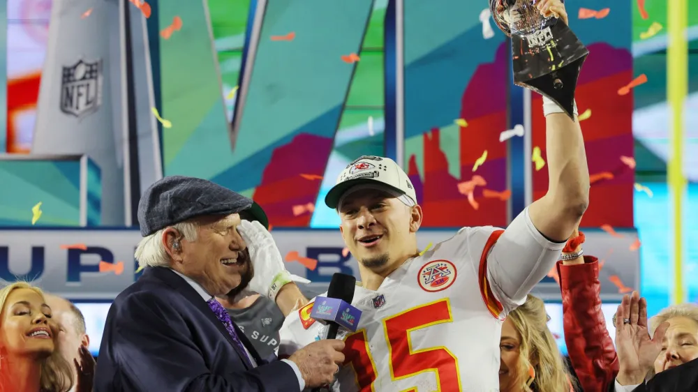 Football - NFL - Super Bowl LVII - Kansas City Chiefs v Philadelphia Eagles - State Farm Stadium, Glendale, Arizona, United States - February 12, 2023 Kansas City Chiefs' Patrick Mahomes celebrates with the Vince Lombardi Trophy after winning Super Bowl LVII REUTERS/Brian Snyder