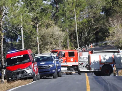 Rescue teams work at the site of the accident of a bus, which was carrying migrants who had traveled through the Darien gap, in Los Planes de Gualaca, Panama February 15, 2023. REUTERS/Stringer NO RESALES. NO ARCHIVES