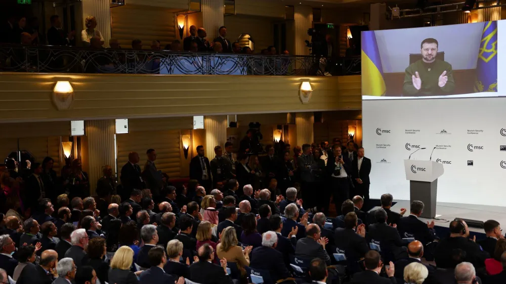 Ukrainian President Volodymyr Zelenskiy appears on the screen during the Munich Security Conference, in Munich, Germany February 17, 2023. REUTERS/Kai Pfaffenbach