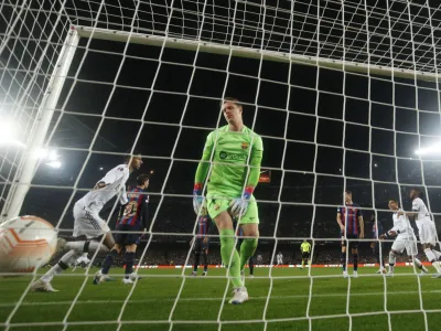 Soccer Football - Europa League - Play-Off First Leg - FC Barcelona v Manchester United - Camp Nou, Barcelona, Spain - February 16, 2023 FC Barcelona's Marc-Andre ter Stegen reacts after Jules Kounde scored an own goal and the second for Manchester United REUTERS/Albert Gea