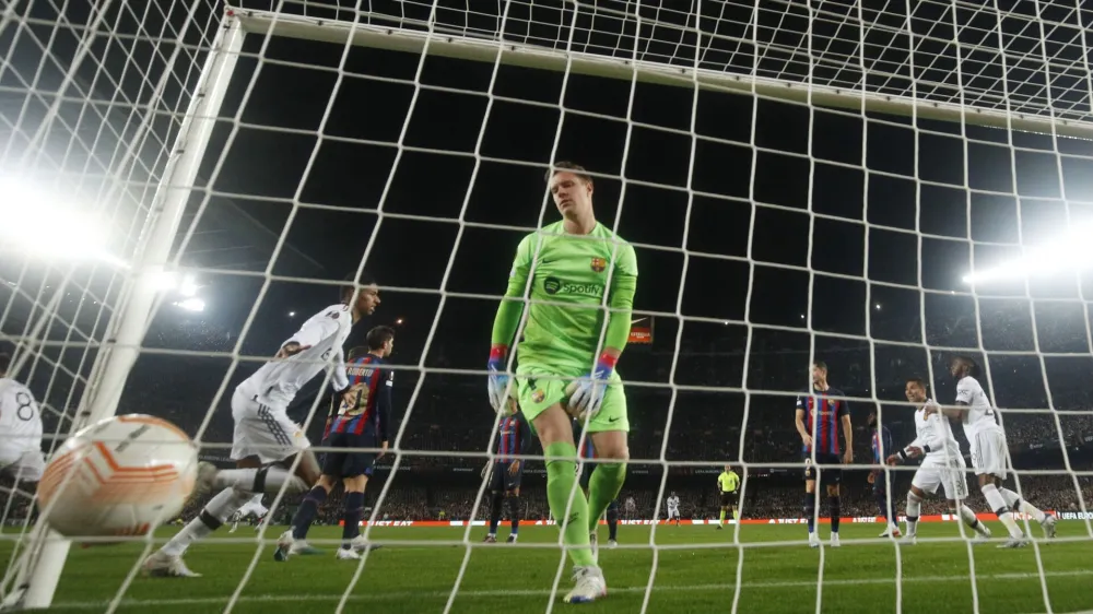 Soccer Football - Europa League - Play-Off First Leg - FC Barcelona v Manchester United - Camp Nou, Barcelona, Spain - February 16, 2023 FC Barcelona's Marc-Andre ter Stegen reacts after Jules Kounde scored an own goal and the second for Manchester United REUTERS/Albert Gea