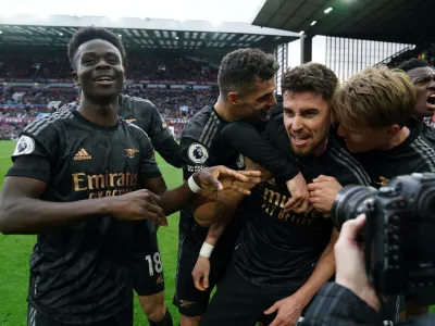 18 February 2023, United Kingdom, Birmingham: Arsenal's Jorginho celebrates his sides third goal, an own goal by Aston Villa goalkeeper Emiliano Martinez during the English Premier League soccer match between Aston Villa and Arsenal at the Villa Park. Photo: Nick Potts/PA Wire/dpa