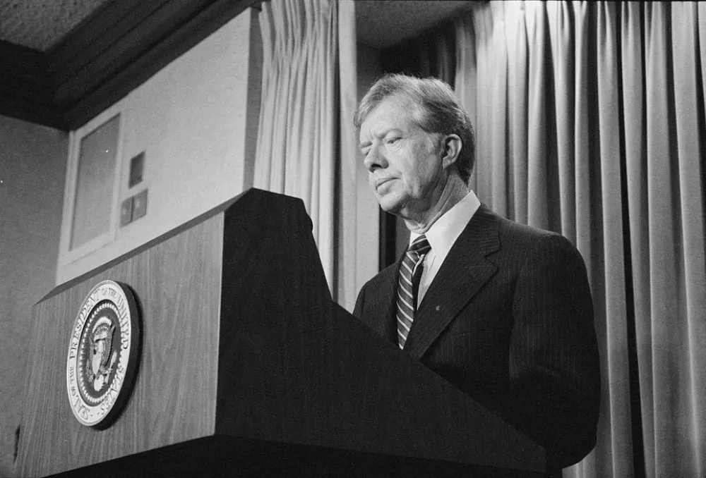 FILE PHOTO: U.S. President Jimmy Carter announces new sanctions against Iran in retaliation for taking U.S. hostages, at the White House, Washington, D.C., U.S., April 7, 1980.  Library of Congress/Marion S. Trikosko/Handout via REUTERS  ATTENTION EDITORS - THIS IMAGE WAS PROVIDED BY A THIRD PARTY./File Photo