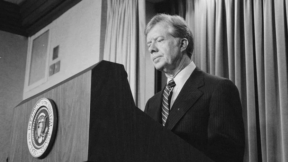 FILE PHOTO: U.S. President Jimmy Carter announces new sanctions against Iran in retaliation for taking U.S. hostages, at the White House, Washington, D.C., U.S., April 7, 1980.  Library of Congress/Marion S. Trikosko/Handout via REUTERS  ATTENTION EDITORS - THIS IMAGE WAS PROVIDED BY A THIRD PARTY./File Photo