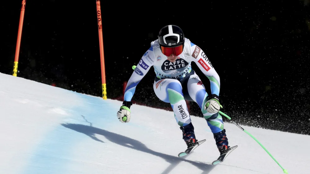 Slovenia's Ilka Stuhec speeds down the course during an alpine ski, women's World Cup downhill training in Crans Montana, Switzerland, Friday, Feb. 24, 2023. (AP Photo/Alessandro Trovati)