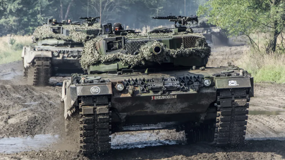 Handout photos of the Polish Defense Ministry shows Leopard 2A4 tanks at the military rest range in Zagan, Poland, Sept.15, 2013. (Polish Defense Ministry via AP)