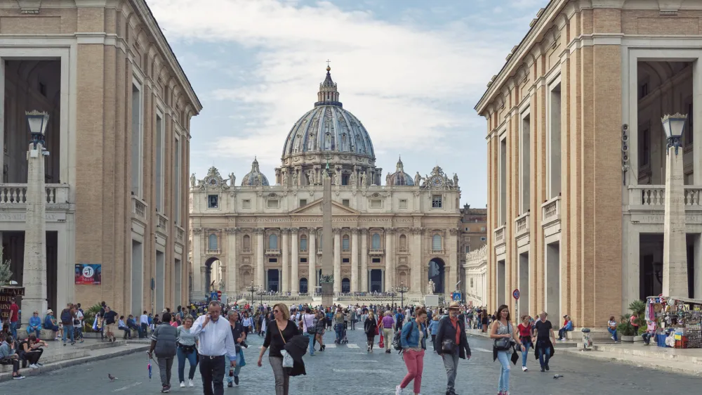 Rome, Italy - October 2019: View from Via della Conciliazione (Road of the Conciliation), one of historic street in Rome, Italy, towards St. Peter's Basilica in Vatican City