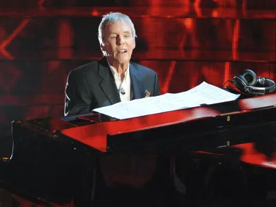 *** CORRECTS YEAR *** American pianist and composer Burt Bacharach performs during the "Festival di Sanremo" Italian song contest, in San Remo, Italy, Thursday, Feb. 19, 2009. (AP Photo/Antonio Calanni)