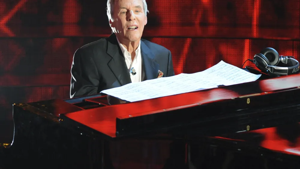 *** CORRECTS YEAR *** American pianist and composer Burt Bacharach performs during the "Festival di Sanremo" Italian song contest, in San Remo, Italy, Thursday, Feb. 19, 2009. (AP Photo/Antonio Calanni)