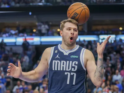 Dallas Mavericks guard Luka Doncic reacts after a foul call during the second half of an NBA basketball game against the Phoenix Suns, Sunday, March 5, 2023, in Dallas. (AP Photo/Gareth Patterson)