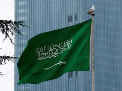 FILE PHOTO: A Saudi flag flutters atop Saudi Arabia's consulate in Istanbul, Turkey October 20, 2018. REUTERS/Huseyin Aldemir/File Photo