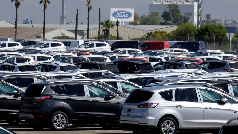 FILE PHOTO: Cars are pictured at the Ford factory in Almussafes near Valencia, Spain June 15, 2018. REUTERS/Heino Kalis/File Photo