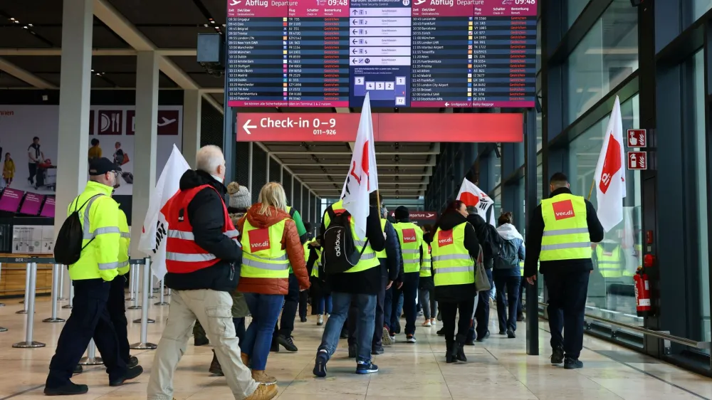 Airport workers protest at BER airport during a strike called by the German trade union Verdi in Berlin, March 13, 2023. REUTERS/Christian Mang