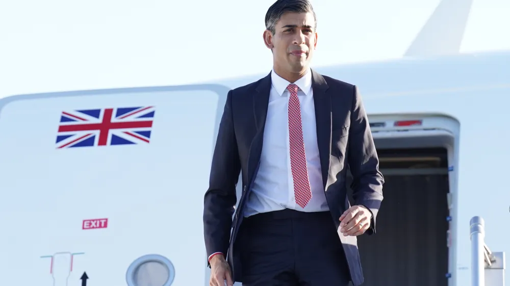 13 March 2023, US, San Diego: British Prime Minister Rishi Sunak disembarks his plane as he arrives in San Diego, for meetings with US President Joe Biden and Prime Minister of Australia Anthony Albanese as part of Aukus, a trilateral security pact between Australia, the UK, and the US. Photo: Stefan Rousseau/PA Wire/dpa