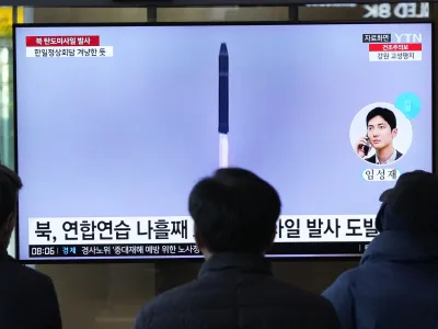 A TV screen shows a file image of North Korea's missile launch during a news program at the Seoul Railway Station in Seoul, South Korea, Thursday, March 16, 2023. North Korea test-launched an intercontinental ballistic missile in a display of military might Thursday just hours before the leaders of South Korea and Japan were to meet at a Tokyo summit expected to be overshadowed by North Korean nuclear threats. (AP Photo/Ahn Young-joon)