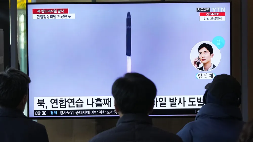 A TV screen shows a file image of North Korea's missile launch during a news program at the Seoul Railway Station in Seoul, South Korea, Thursday, March 16, 2023. North Korea test-launched an intercontinental ballistic missile in a display of military might Thursday just hours before the leaders of South Korea and Japan were to meet at a Tokyo summit expected to be overshadowed by North Korean nuclear threats. (AP Photo/Ahn Young-joon)