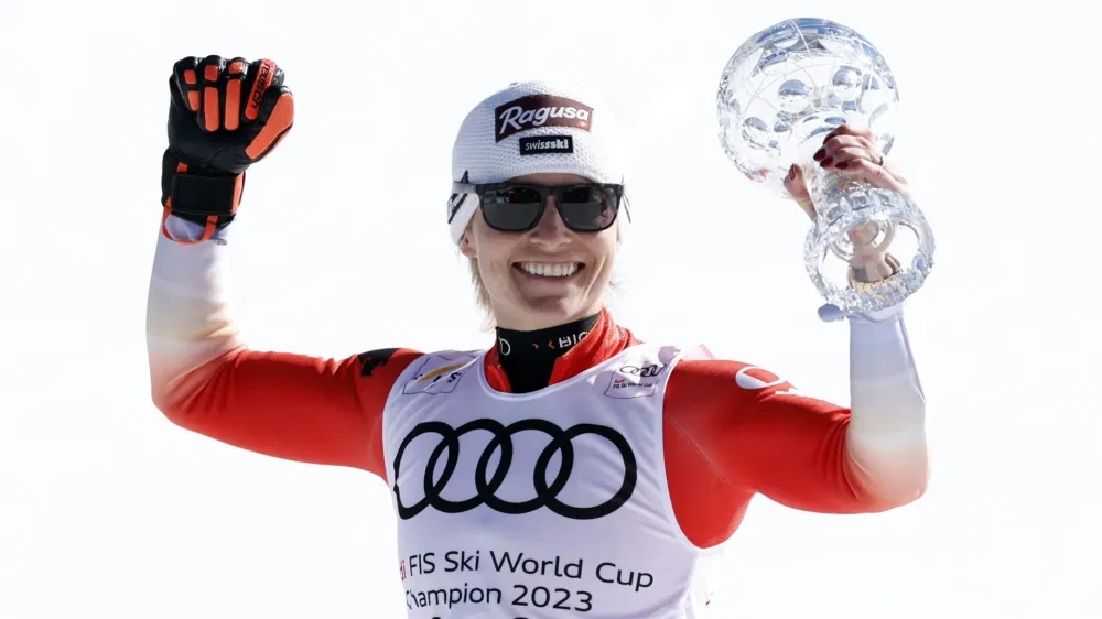 Alpine Skiing - FIS Alpine Ski World Cup - Women's Super G - Soldeu, Andorra - March 16, 2023 Switzerland's Lara Gut-Behrami celebrates with the crystal globe after winning the women's Super G for the season REUTERS/Albert Gea