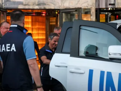 IAEA Director General Rafael Mariano Grossi gets into a UN car before the International Atomic Energy Agency (IAEA) mission departs for visit to Zaporizhzhia nuclear power plant amid Russia's invasion of Ukraine, in central Kyiv, Ukraine August 31, 2022. REUTERS/Gleb Garanich
