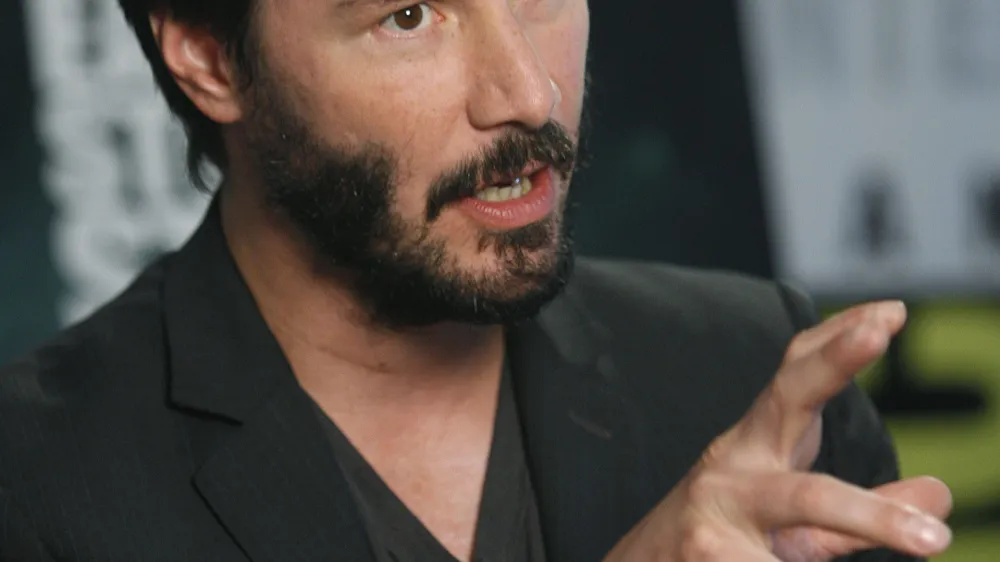 Actor Keanu Reeves talks about his new movie "The Day the Earth Stood Still" during an interview at the Comic-Con 2008 convention Thursday, July 24, 2008 in San Diego. (AP Photo/Denis Poroy)