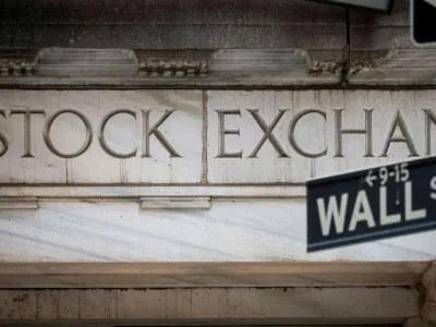 FILE PHOTO: The Wall Street entrance to the New York Stock Exchange (NYSE) is seen in New York City, U.S., November 15, 2022. REUTERS/Brendan McDermid/File Photo/File Photo