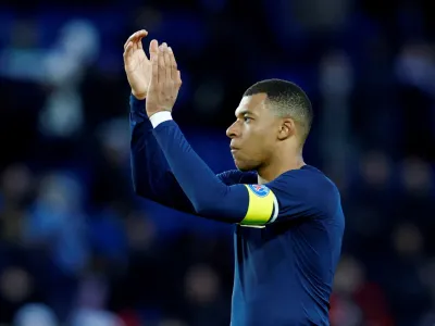 FILE PHOTO: Soccer Football - Ligue 1 - Paris St Germain v Stade Rennes - Parc des Princes, Paris, France - March 19, 2023 Paris St Germain's Kylian Mbappe looks dejected after the match REUTERS/Gonzalo Fuentes/File Photo