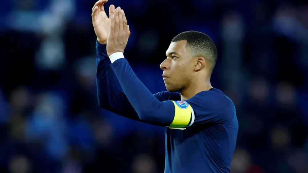 FILE PHOTO: Soccer Football - Ligue 1 - Paris St Germain v Stade Rennes - Parc des Princes, Paris, France - March 19, 2023 Paris St Germain's Kylian Mbappe looks dejected after the match REUTERS/Gonzalo Fuentes/File Photo