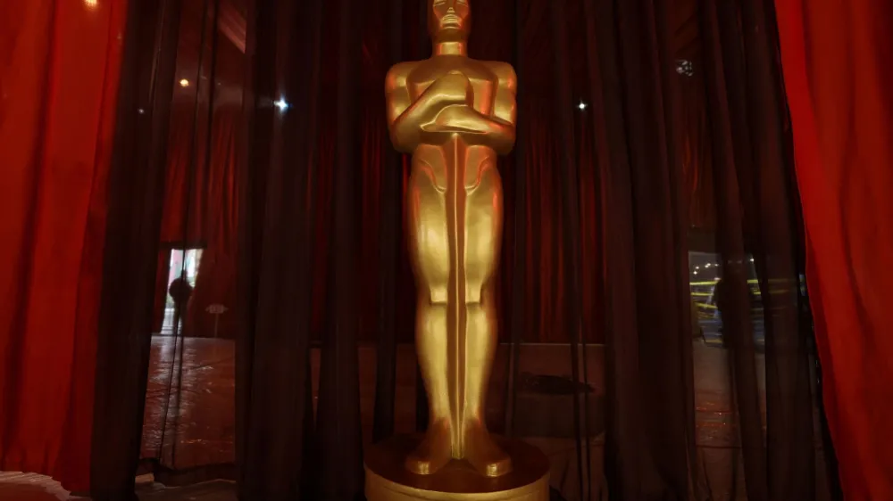 An Oscar statue is pictured at the arrivals area, as preparations continue for the 95th Academy Awards in Los Angeles, California, U.S., March 11, 2023. REUTERS/Mario Anzuoni